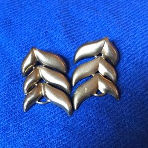 Three-tiered brass leaf earrings